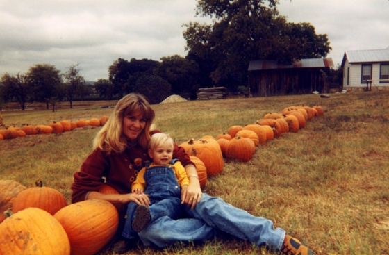 mother and child with pumpkins